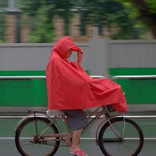 Wind is why umbrella raingear works on a bicycle but not a motorbike